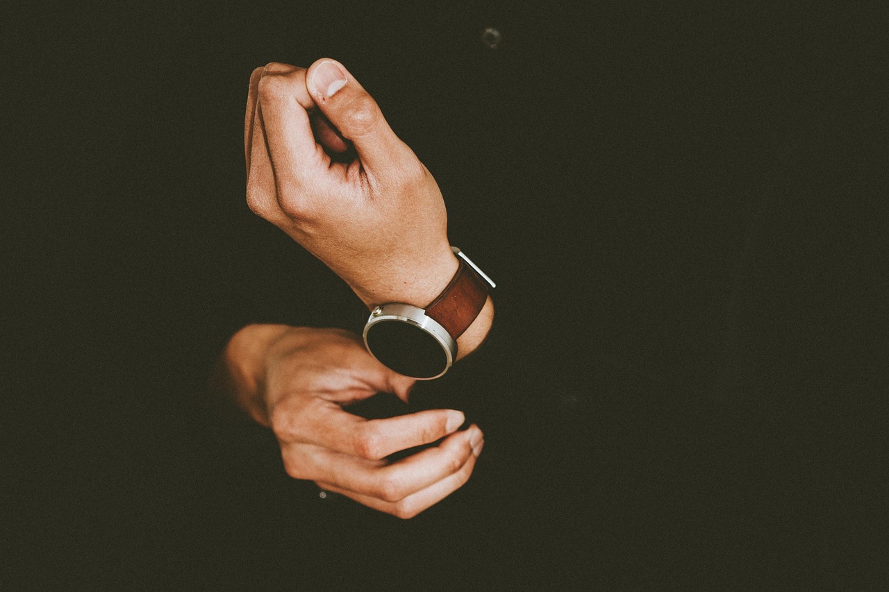 Hands, man, watch — Columbus, Ohio FHA Loans: Your Path to Homeownership in the Buckeye State
