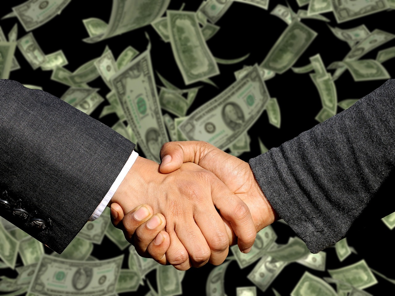 Handshake, agreement, trade — Crafting Your Online Empire: An Integrated Business Guide