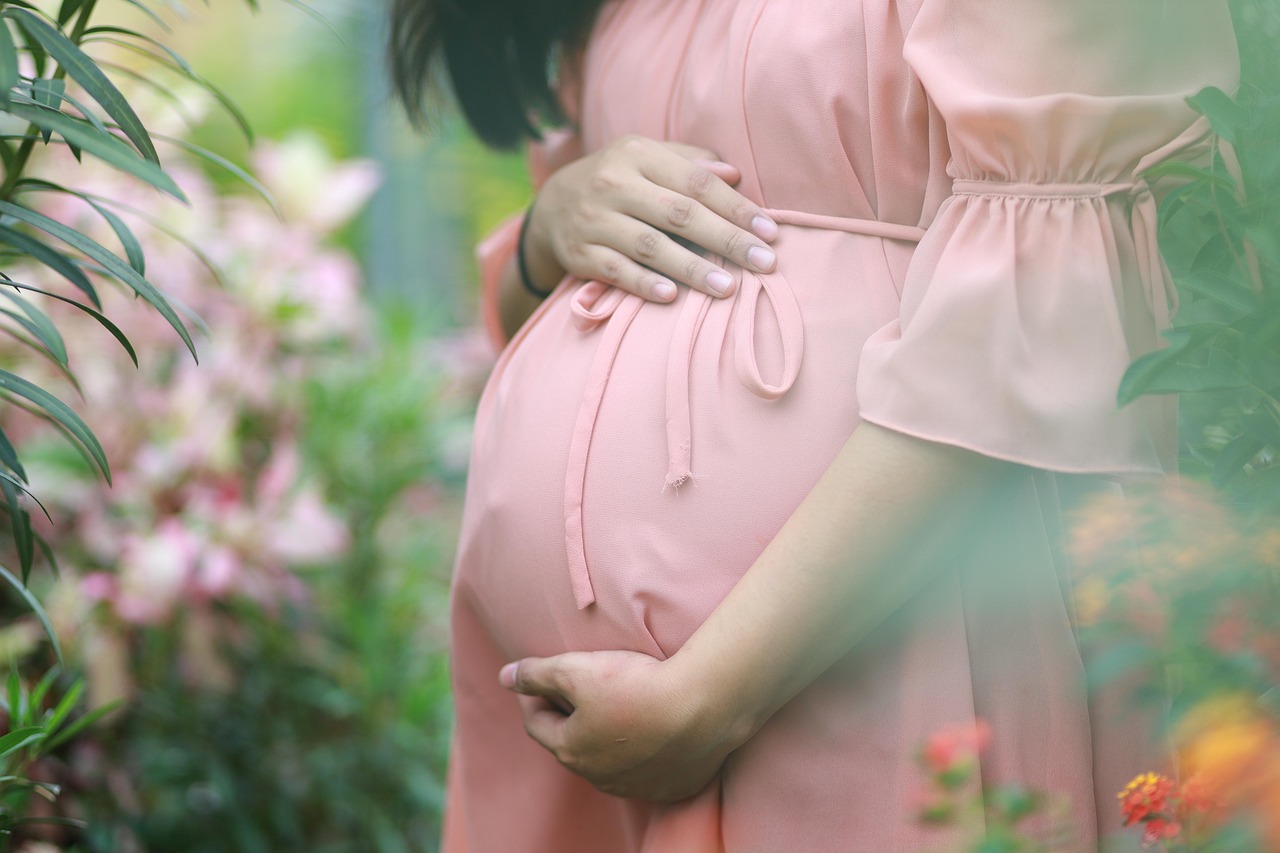 Pregnant, woman, belly — The Advantages of Outsource Payroll Services